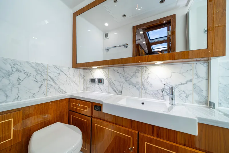Slide: The Image of Luxurious bathroom interior of 2027 HCB 65 Estrella yacht with marble and wood finishes. - 89