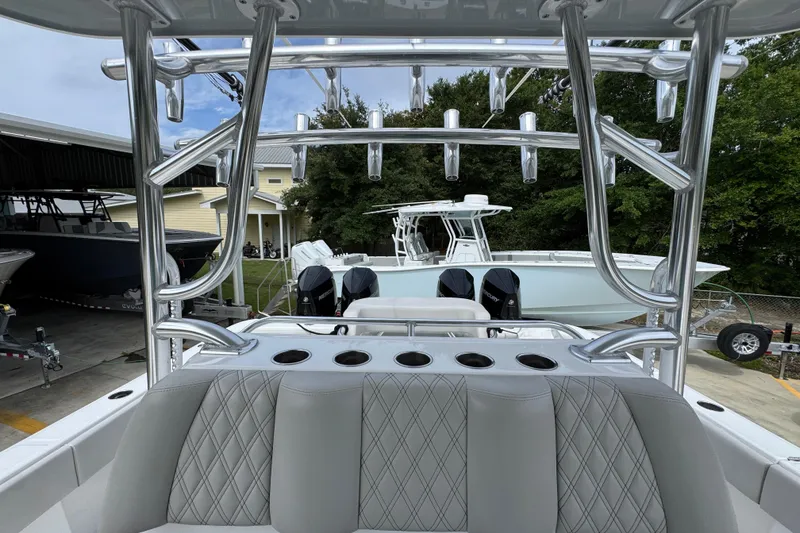 Slide: The Image of 2020 Invincible 35 Catamaran with dual engines and sleek seating design. - 30