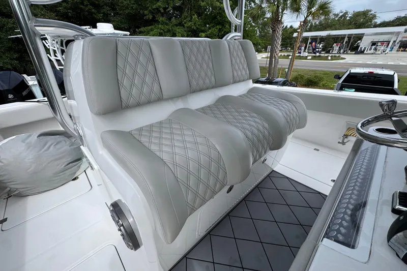 Slide: The Image of Luxurious seating on 2020 Invincible 35 Catamaran, featuring diamond-stitched upholstery. - 31