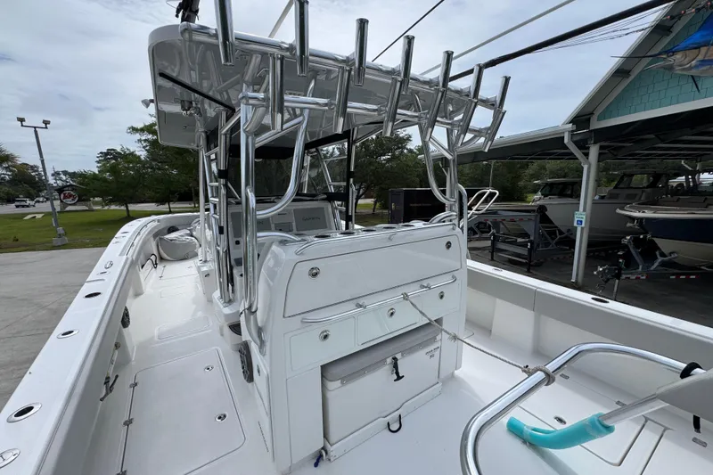 Slide: The Image of 2020 Invincible 35 Catamaran with sleek white deck and modern fishing setup. - 38