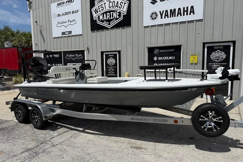The Image of 2023 Maverick 18 HPX-V boat on trailer at West Coast Marine dealership. - 1