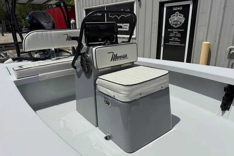 Slide: The Image of 2023 Maverick 18 HPX-V boat interior with white seating and console. - 5