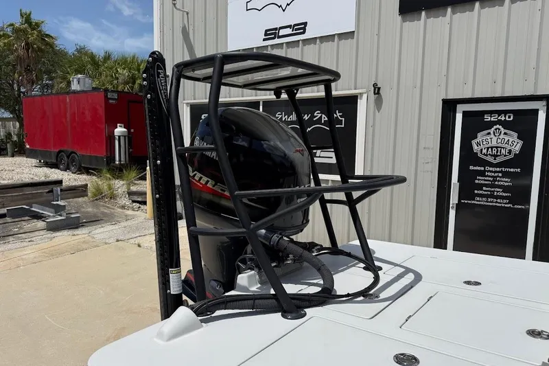 Slide: The Image of 2023 Maverick 18 HPX-V boat engine with protective cage at West Coast Marine. - 7