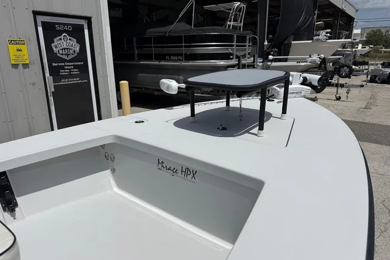 Slide: The Image of 2023 Maverick 18 HPX-V boat at West Coast Marine service department. - 9