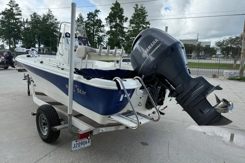 Slide: The Image of 2017 NauticStar 1910 NauticBay boat with Yamaha outboard motor on trailer. - 4