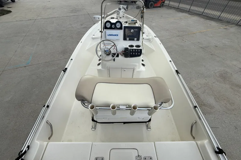 Slide: The Image of 2017 NauticStar 1910 NauticBay boat interior with steering console and seating. - 7