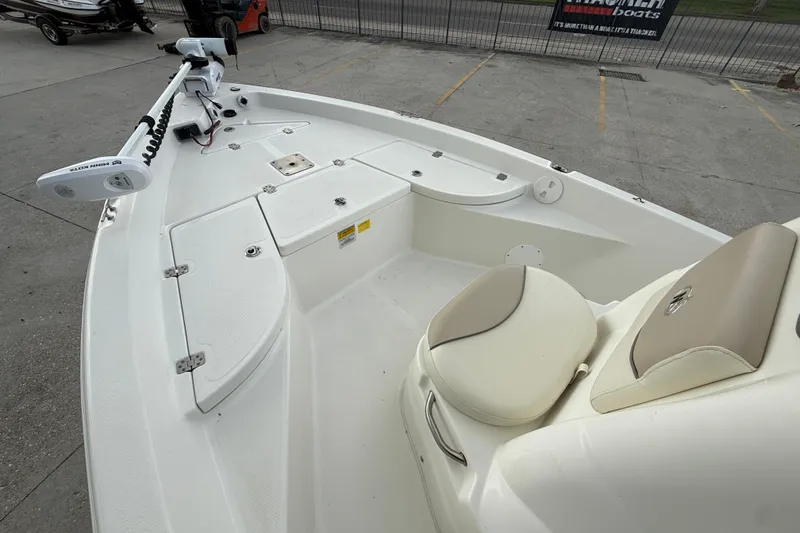 Slide: The Image of 2017 NauticStar 1910 NauticBay boat interior with seating and storage compartments. - 9
