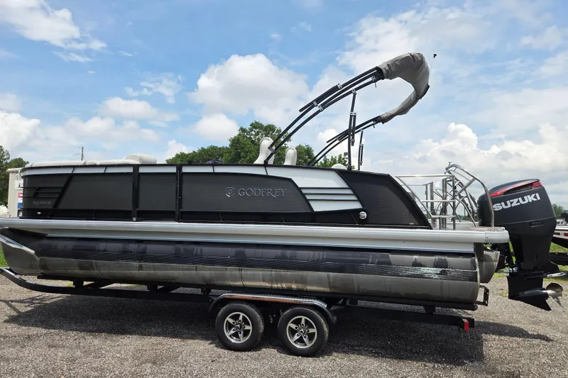 The Image of 2020 Godfrey AquaPatio 235 UL pontoon boat with Suzuki outboard motor on trailer. - 0