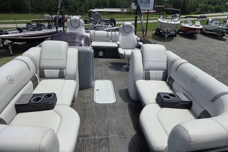 Slide: The Image of 2020 Godfrey AquaPatio 235 UL pontoon boat with luxurious seating and cup holders. - 19