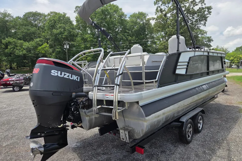 Slide: The Image of 2020 Godfrey AquaPatio 235 UL pontoon boat with Suzuki outboard motor on trailer. - 5