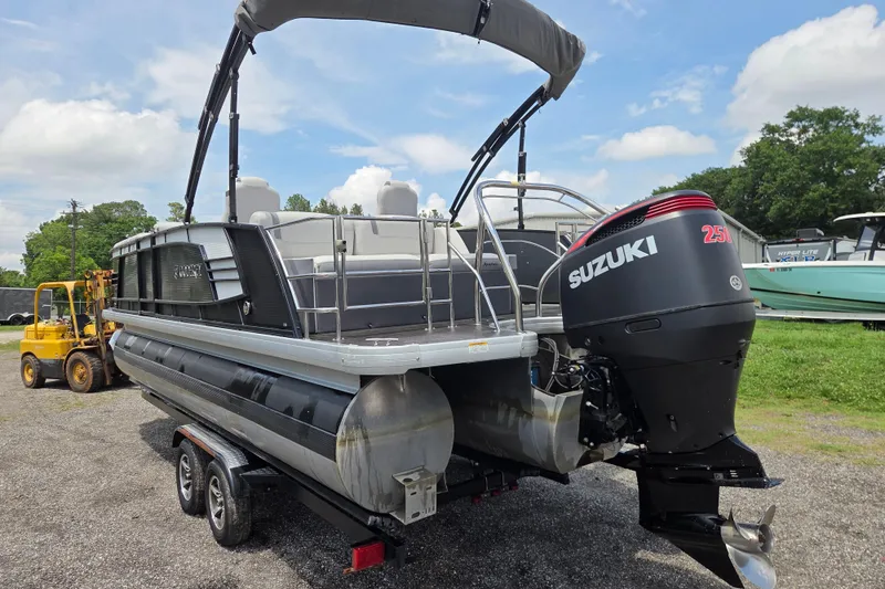 Slide: The Image of 2020 Godfrey AquaPatio 235 UL pontoon boat with Suzuki 250 outboard motor on trailer. - 7