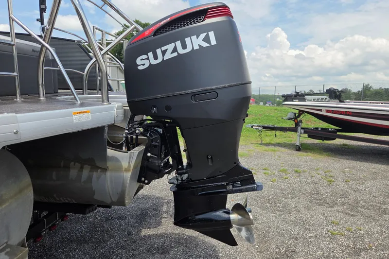 Slide: The Image of 2020 Godfrey AquaPatio 235 UL with Suzuki outboard motor on a sunny day. - 8