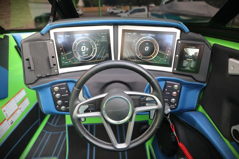 Slide: The Image of 2022 Centurion Ri265 dashboard with dual digital displays and modern steering wheel. - 7