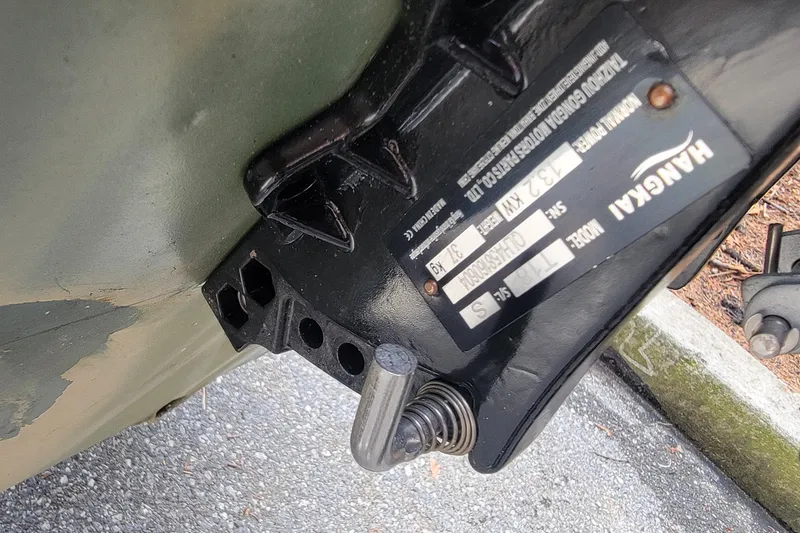 Slide: The Image of Close-up of a 1994 Alumacraft 1436 Jon boat component with Hangkai label. - 5
