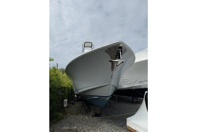 Slide: The Image of 2022 Valhalla Boatworks V-41 on dry dock, showcasing sleek hull design. - 10
