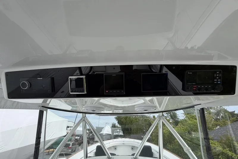 Slide: The Image of 2022 Valhalla Boatworks V-41 helm with advanced navigation and communication systems. - 14