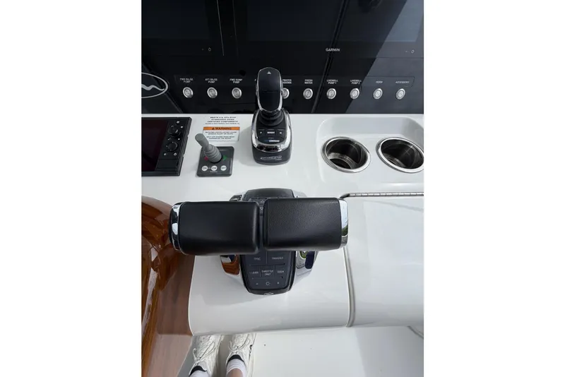Slide: The Image of Control panel of 2022 Valhalla Boatworks V-41 with joystick and throttle controls. - 15