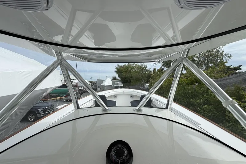 Slide: The Image of 2022 Valhalla Boatworks V-41, sleek design with sturdy framework, docked outdoors. - 16