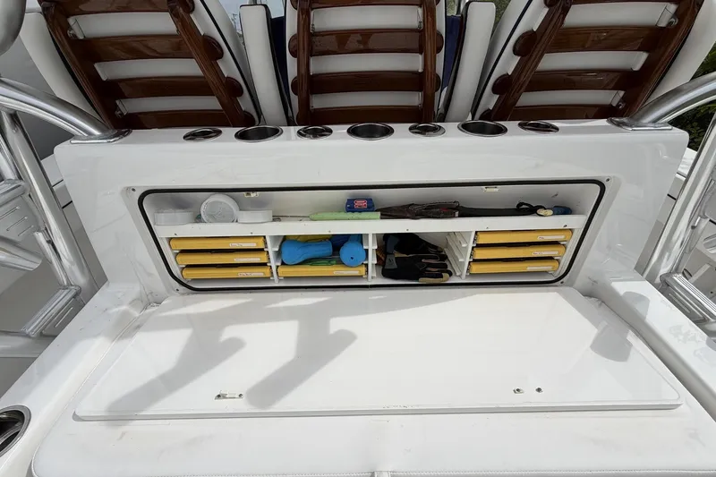 Slide: The Image of 2022 Valhalla Boatworks V-41 storage compartment with organized fishing gear and accessories. - 27