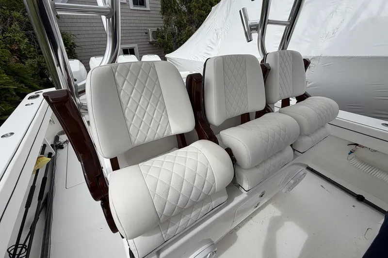 Slide: The Image of Luxurious white seating on 2022 Valhalla Boatworks V-41, featuring diamond-stitched upholstery. - 30