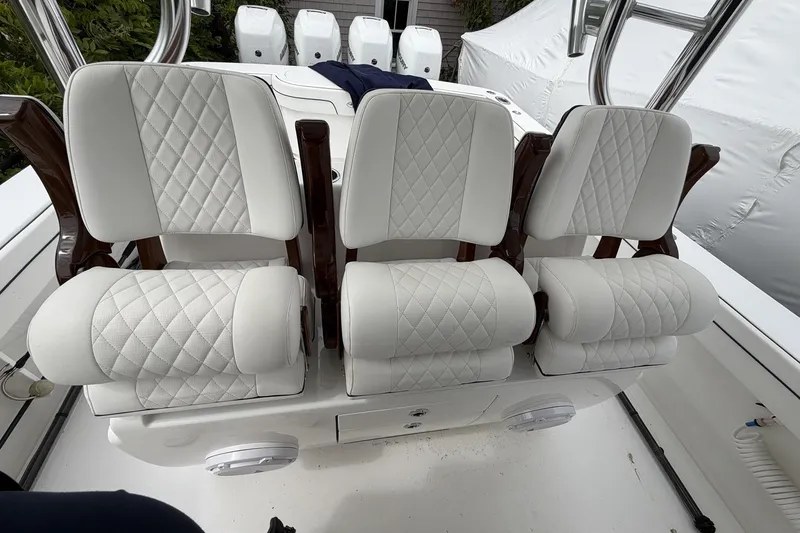 Slide: The Image of Luxurious seating on 2022 Valhalla Boatworks V-41, featuring quilted white upholstery and sleek design. - 31