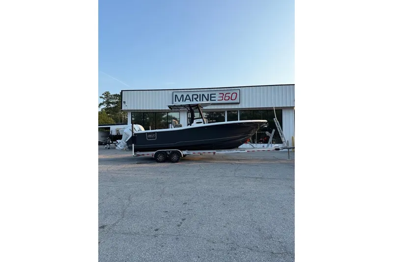 The Image of 2026 Sea Hunt Gamefish 27 Coffin Box boat on trailer outside Marine 360 dealership. - 0