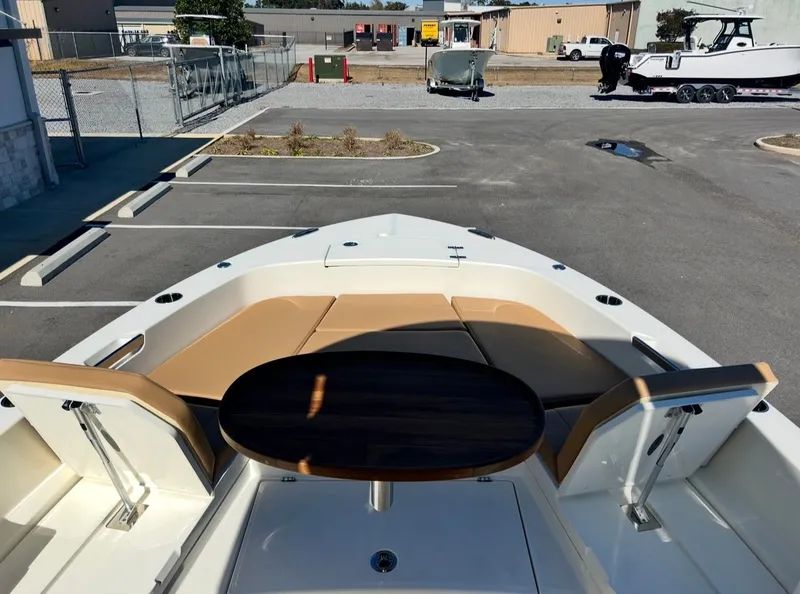 Slide: The Image of 2026 Pathfinder 2400 TRS with outdoor seating and table. - 16