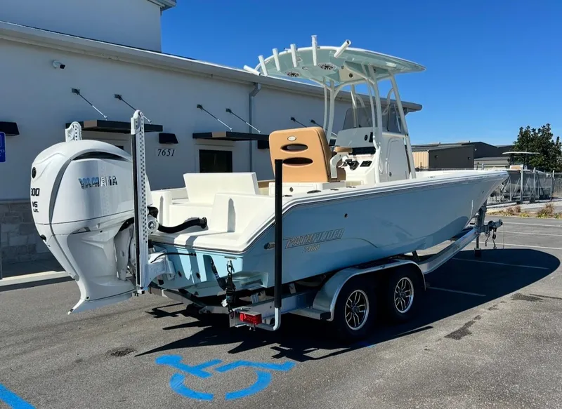 Slide: The Image of 2026 Pathfinder 2400 TRS boat with Yamaha engine on trailer. - 3
