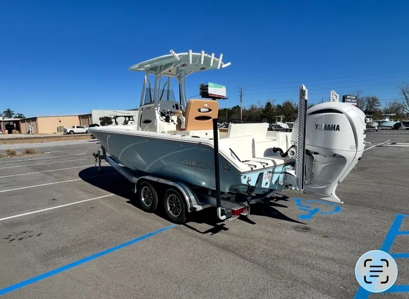 Slide: The Image of 2026 Pathfinder 2400 TRS boat parked on trailer outdoors. - 6