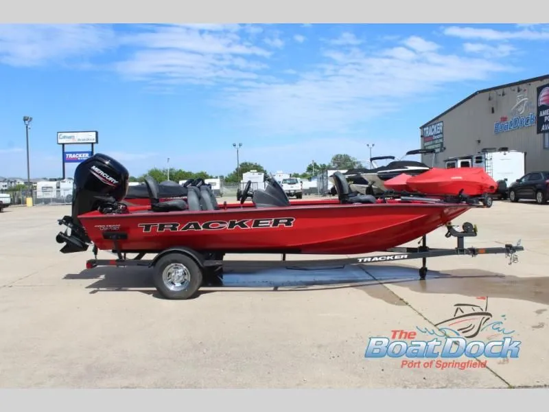The Image of Red 2026 Pro Team 175 TXW boat on trailer outdoors. - 1