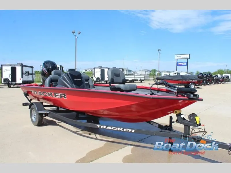 Slide: The Image of Red 2026 Pro Team 175 TXW boat on trailer outdoors. - 3