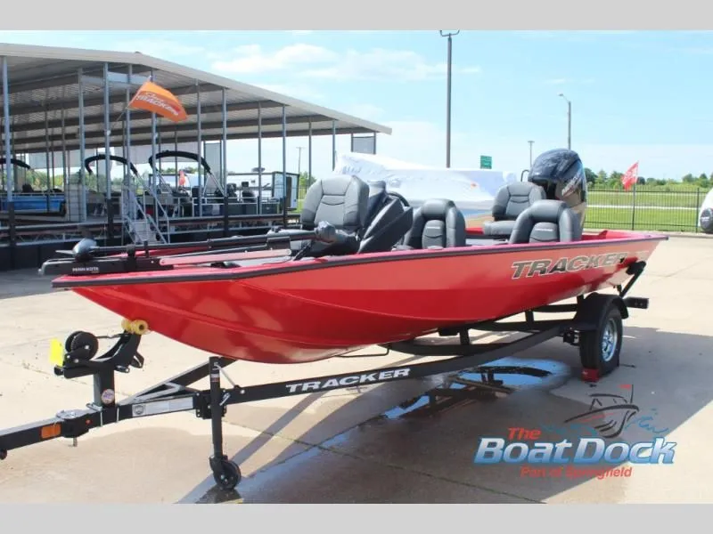 Slide: The Image of Red 2026 Pro Team 175 TXW boat on trailer outdoors. - 5