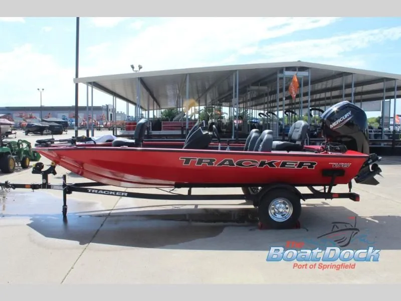 Slide: The Image of Red 2026 Pro Team 175 TXW boat on trailer at dock. - 6