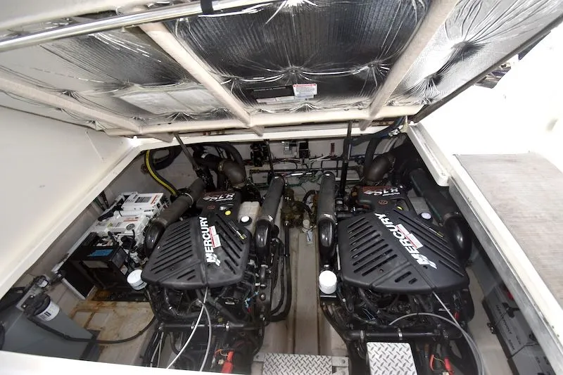 Slide: The Image of Engine room of 2007 Sea Ray 40 Sundancer with twin Mercury engines. - 15