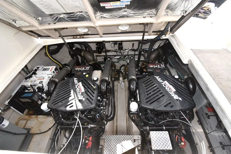 Slide: The Image of Engine room of 2007 Sea Ray 40 Sundancer with twin Mercury engines. - 16
