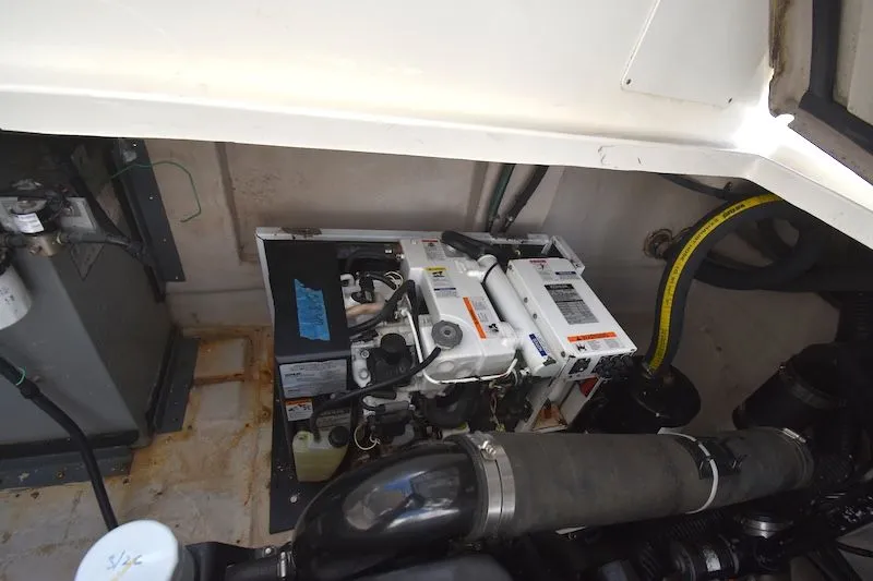 Slide: The Image of Engine compartment of a 2007 Sea Ray 40 Sundancer boat. - 19