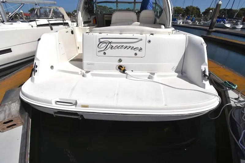 Slide: The Image of 2007 Sea Ray 40 Sundancer yacht docked, rear view. - 24