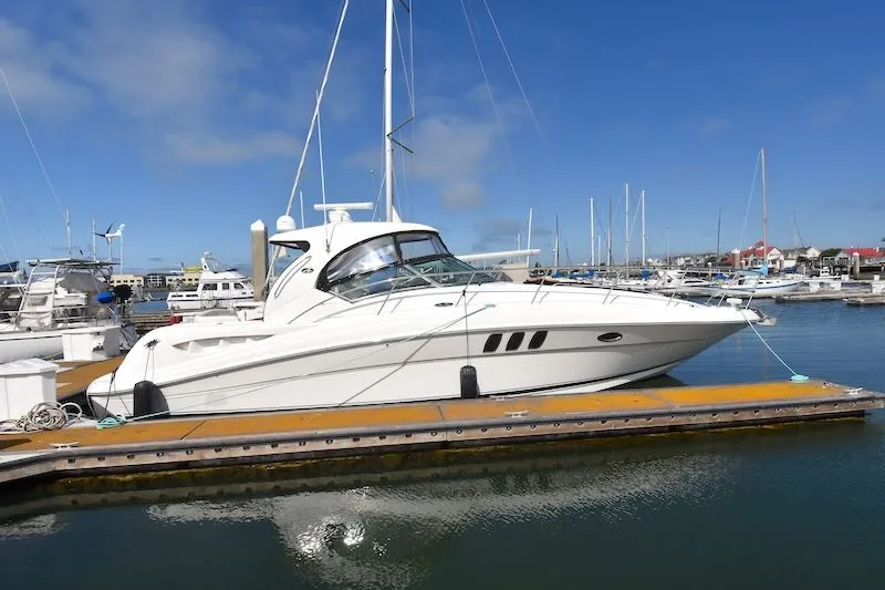 Slide: The Image of 2007 Sea Ray 40 Sundancer yacht docked in marina. - 25