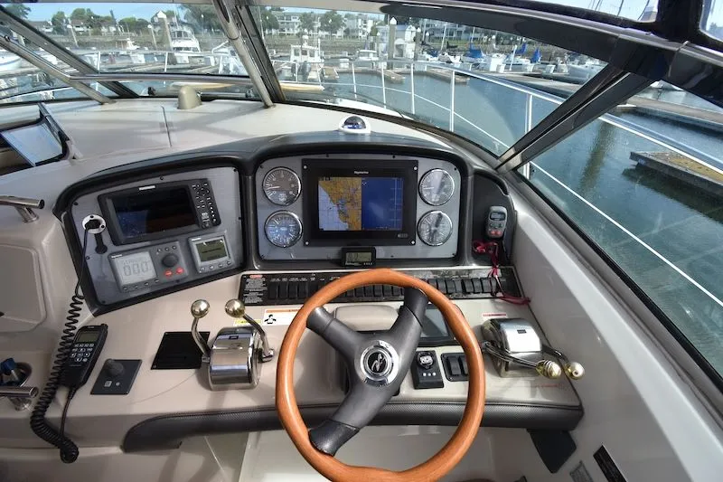 Slide: The Image of 2007 Sea Ray 40 Sundancer helm with navigation system. - 27