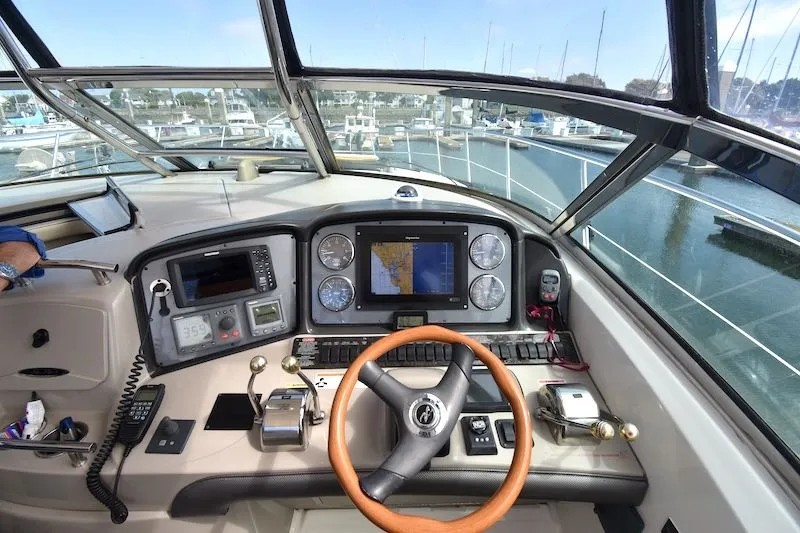 Slide: The Image of 2007 Sea Ray 40 Sundancer helm with navigation system. - 28