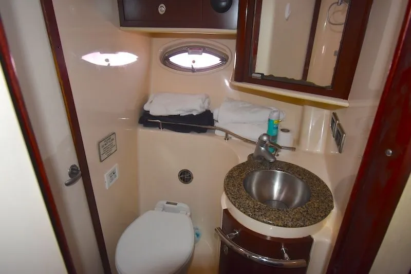 Slide: The Image of Sea Ray 40 Sundancer 2007 bathroom with sink and toilet. - 4