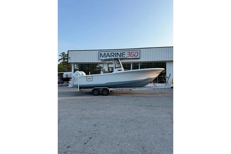 The Image of 2026 Sea Hunt Gamefish 27 boat on trailer outside Marine 360 dealership. - 0