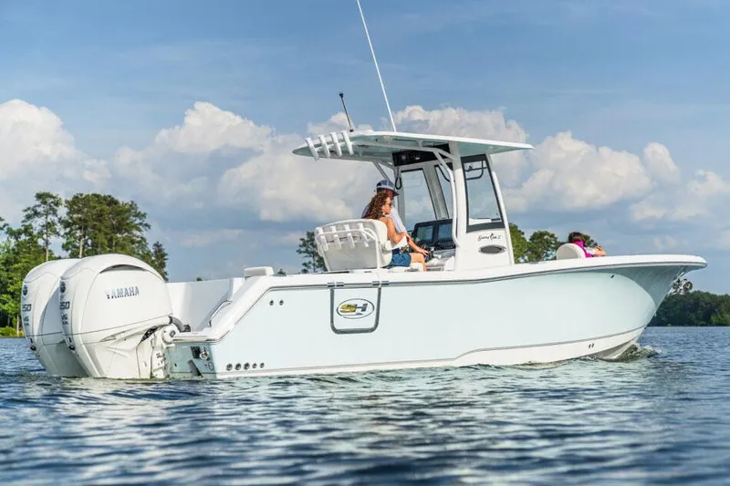Slide: The Image of Manufacturer Provided Image: 2026 Sea Hunt Gamefish 27 boat on water, featuring forward seating and Yamaha engines. - 6
