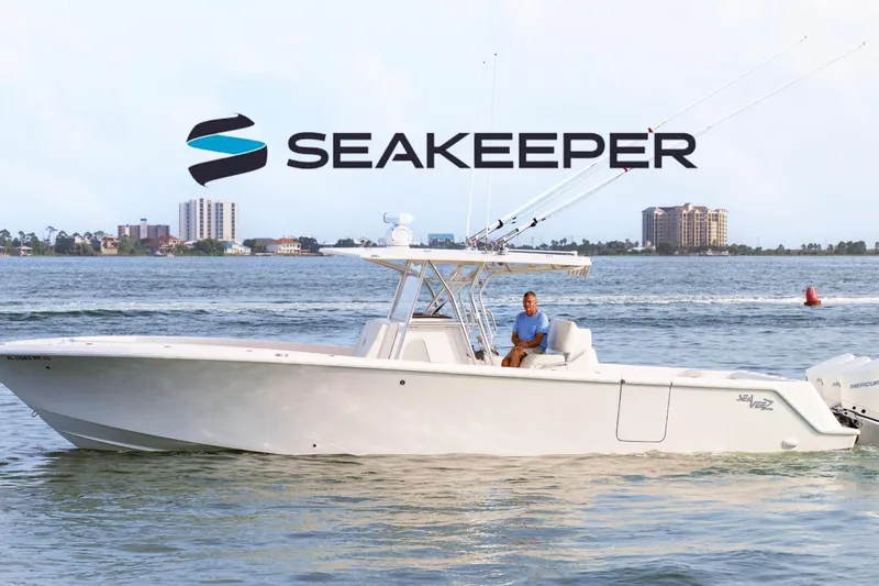 The Image of 2022 SeaVee 370Z boat on water with Seakeeper logo in background. - 0