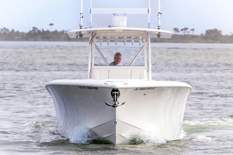Slide: The Image of 2022 SeaVee 370Z boat cruising on open water, front view. - 10