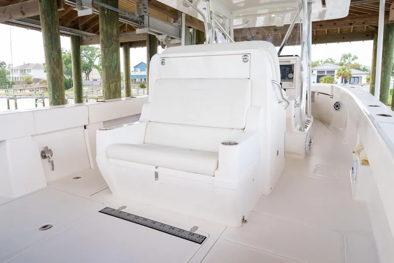 Slide: The Image of 2022 SeaVee 370Z boat interior with white seating and modern design. - 22