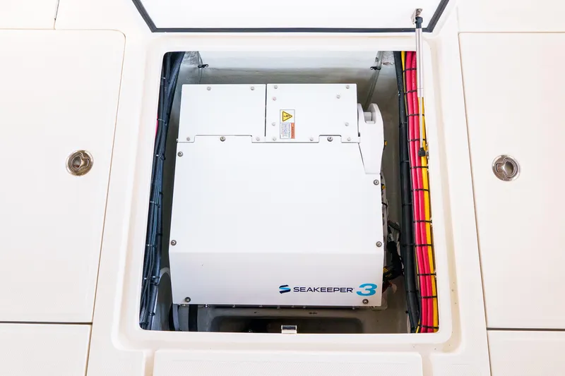 Slide: The Image of Seakeeper 3 stabilizer installed in 2022 SeaVee 370Z boat compartment. - 27