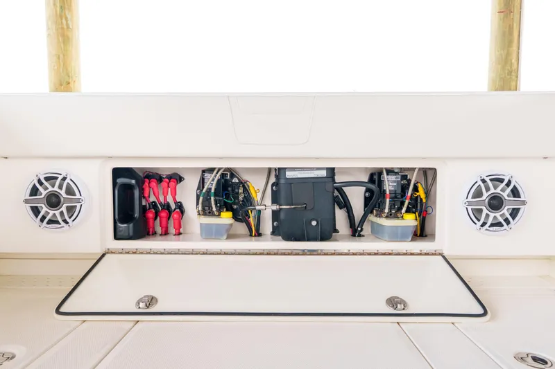 Slide: The Image of 2022 SeaVee 370Z boat electrical panel with speakers and wiring components. - 29