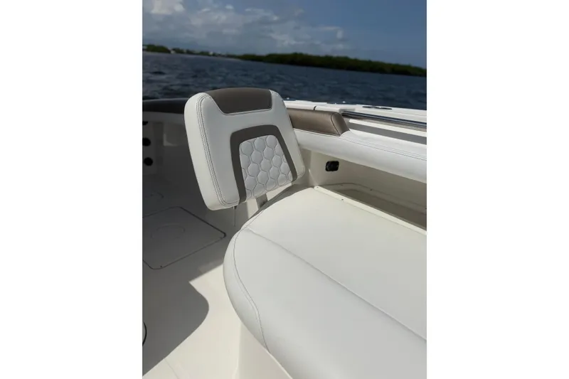 Slide: The Image of Luxury seating on 2020 World Cat 325 CC boat with ocean backdrop. - 20