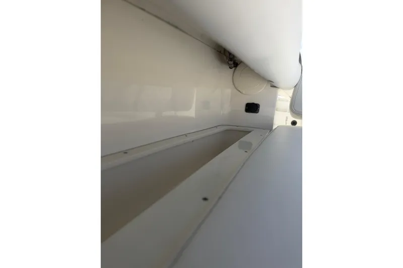 Slide: The Image of Interior view of a 2020 World Cat 325 CC boat, showcasing sleek design details. - 25
